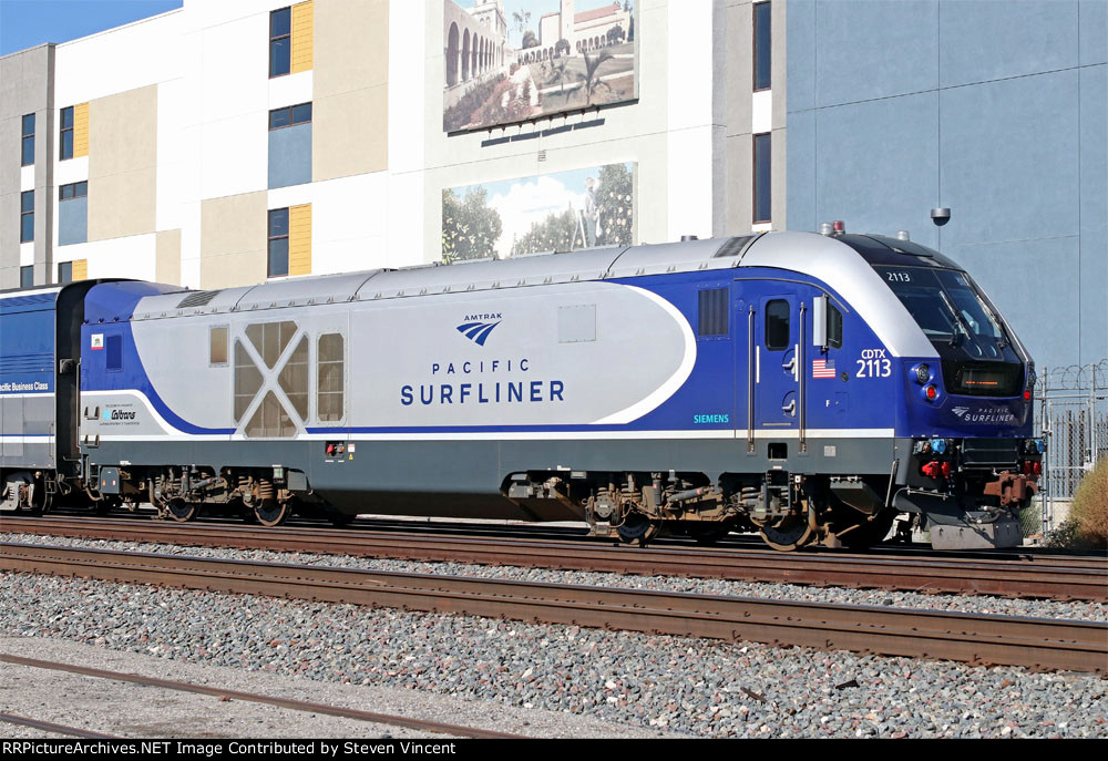 Caltrans Charger CDTX #2113 pushes a late Amtrak train #767 toward Los Angeles.